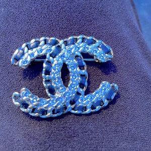 Chanel costume brooch.  Metal black threading.Costume C. Clasp. Great for suits.